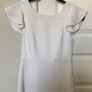 white dress with ruffles sleeve and detail back